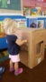 preschool_girl_coloring_cardboard_box_cadence_academy_preschool_surfside_myrtle_beach_sc-253x450