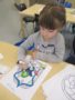 preschool_girl_coloring_flowers_adventures_in_learning_oswego_il-338x450