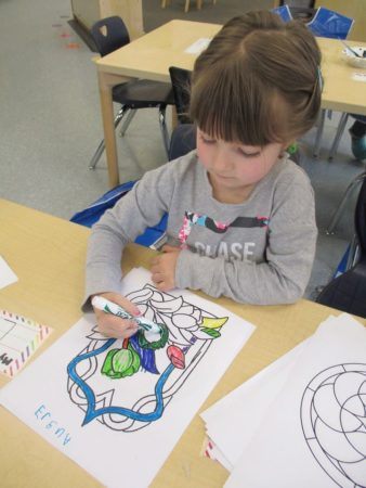 preschool_girl_coloring_flowers_adventures_in_learning_oswego_il-338x450