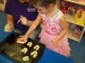 preschool_girl_cutting_shapes_in_dough_creative_kids_childcare_centers_brewster-600x450