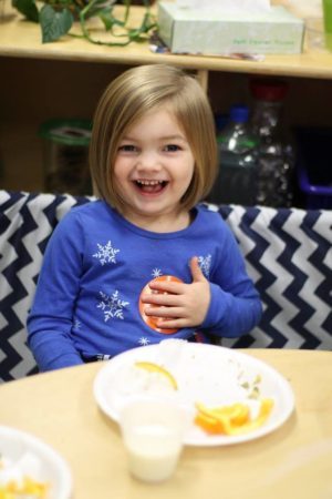 preschool_girl_eating_lunch_cadence_academy_preschool_steele_creek_charlotte_nc-300x450