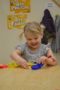 preschool_girl_enjoy_playdough_at_phoenix_childrens_academy_private_preschool_estrella_mountain_az-300x450