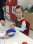 preschool_girl_enjoying_cooking_activity_growing_kids_academy_fredericksburg_va-333x450