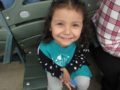 preschool_girl_enjoying_trip_to_baseball_game_rogys_learning_place_lake_street_peoria_heights_il-600x450