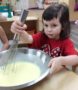 preschool_girl_food_activity_cadence_academy_preschool_yelm_highway_olympia_wa-392x450