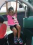 preschool_girl_hanging_from_bar_on_playground_cadence_academy_preschool_austin_cedar_park_tx-336x450