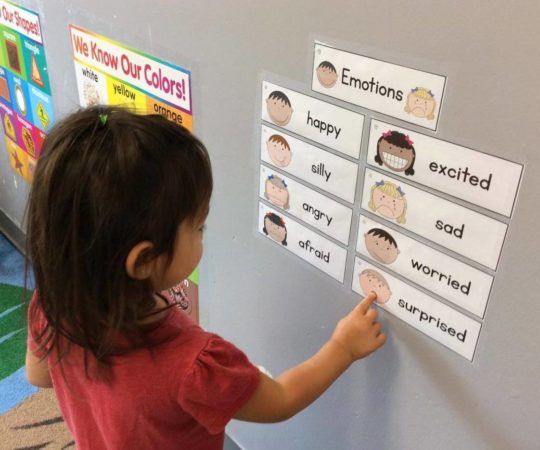 preschool_girl_identifying_her_emotion_cadence_academy_preschool_johnston_ia-540x450