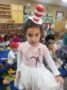 preschool_girl_in_cat_in_the_hat_outfit_cadence_academy_preschool_san_antonio_tx-336x450