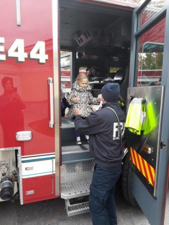 preschool_girl_in_fire_truck_canterbury_preparatory_school_overland_park_ks-338x450