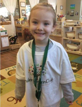 preschool_girl_in_kindergarten_club_t-shirt_at_cadence_academy_preschool_columbine_littleton_co-344x450 (1)