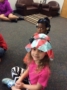 preschool_girl_in_paper_hat_rogys_learning_place_lake_street_peoria_heights_il-336x450