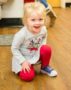 preschool_girl_in_red_leggings_cadence_academy_preschool_wilmington_nc-354x450