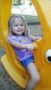 preschool_girl_in_rocker_on_the_playground_at_stonebridge_academy_bremen_ga-253x450