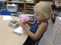 preschool_girl_making_an_ice_cream_cone_cadence_academy_preschool_urbandale_ia-605x450