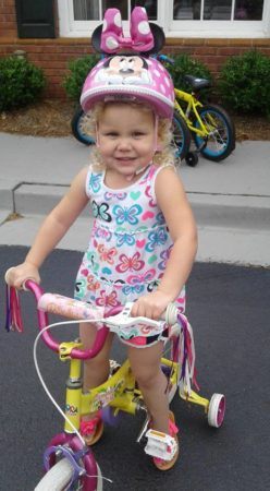 preschool_girl_on_bike_with_training_wheels_sunbrook_academy_at_stilesboro_kennesaw_ga-248x450