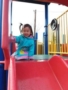 preschool_girl_on_playground_at_cadence_academy_preschool_clackamas_or-338x450