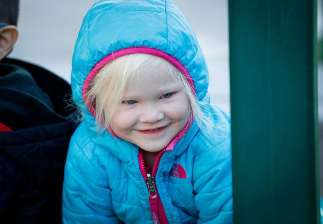 preschool_girl_on_playground_cadence_academy_burr_ridge_il-647x450