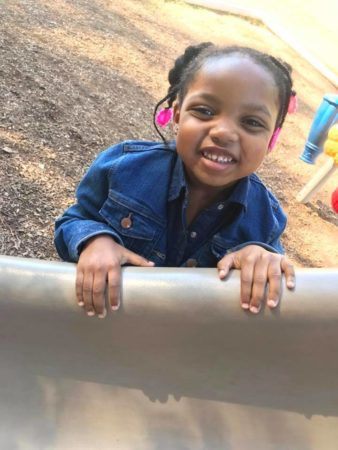 preschool_girl_on_slide_sunbrook_academy_at_stockbridge_ga-338x450