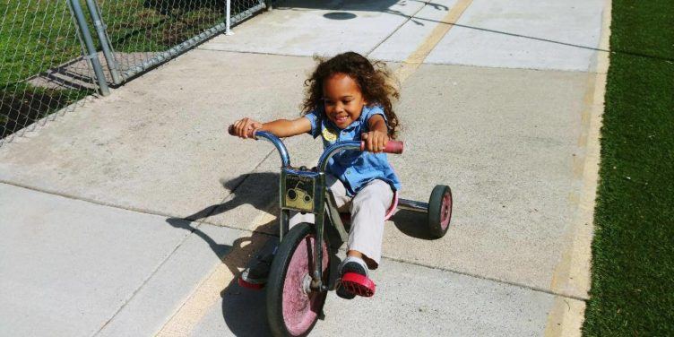 preschool_girl_on_tricycle_at_the_phoenix_schools_private_preschool_antelope_ca-752x376