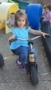 preschool_girl_on_tricycle_on_playground_at_cadence_academy_preschool_the_colony_tx-253x450