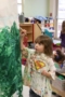 preschool_girl_painting_large_column_at_cadence_academy_preschool_broomfield_co-300x450