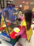 preschool_girl_painting_with_cardboard_brush_creative_expressions_learning_center_imperial_mo-333x450