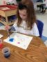 preschool_girl_painting_with_dropper_at_next_generation_childrens_centers_andover_ma-338x450