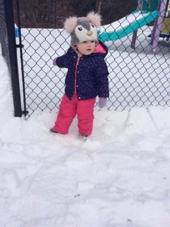 preschool_girl_playing_in_snow_next_generation_childrens_centers_sudbury_ma-336x450