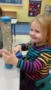 preschool_girl_playing_with_bead_toy_prime_time_early_learning_centers_east_rutherford_nj-253x450