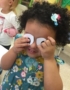preschool_girl_playing_with_googly_eyes_prime_time_early_learning_centers_east_rutherford_nj-351x450