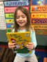 preschool_girl_reading_with_her_eyes_shut_winwood_childrens_center_reston_va-338x450