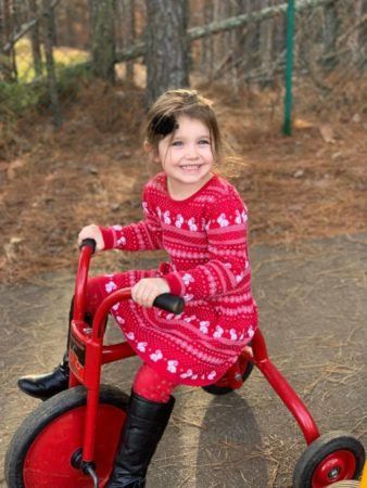 preschool_girl_riding_tricycle_sunbrook_academy_at_legacy_park_kennesaw_ga-338x450