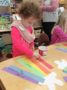 preschool_girl_sorting_cereal_by_color_creative_expressions_learning_center_eureka_mo-336x450