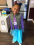 preschool_girl_standing_in_classroom_the_bridge_learning_center_carrollton_ga-338x450