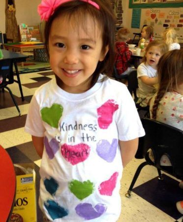 preschool_girl_wearing_kindness_t-shirt_cadence_academy_preschool_roseville_galleria_ca-372x450