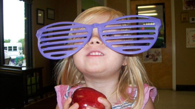 preschool_girl_wearing_large_glasses_at_cadence_academy_preschool_lexington_sc-752x423
