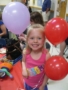 preschool_girl_with_balloons_at_next_generation_childrens_centers_marlborough_ma-338x450