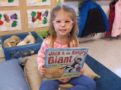 preschool_girl_with_book_at_cadence_academy_ballantyne_charlotte_nc-1024x764-603x450