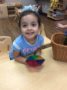 preschool_girl_with_manipulative_cadence_academy_preschool_cypress_houston_tx-333x450