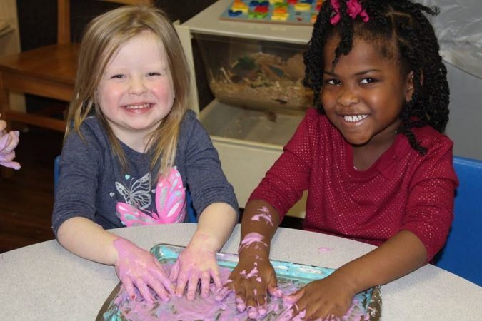 preschool_girls_doing_finger_painting_activity_sunbrook_academy_at_stilesboro_kennesaw_ga-675x450