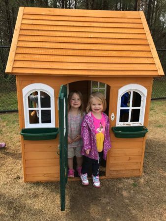 preschool_girls_enjoying_house_on_playground_at_sunbrook_academy_at_woodstock_ga-338x450