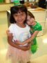 preschool_girls_huggin_during_st_patricks_day_cadence_academy_preschool_carmichael_ca-338x450