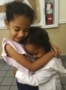preschool_girls_hugging_at_cadence_academy_preschool_grand_prairie_tx-332x450
