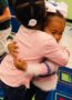 preschool_girls_hugging_at_cadence_academy_preschool_summerville_sc-324x450