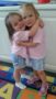 preschool_girls_hugging_peachtree_park_prep_medlock_johns_creek_ga-253x450