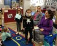 preschool_girls_learning_about_dental_hygiene_at_cadence_academy_preschool_broomfield_co-560x450