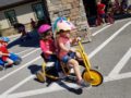 preschool_girls_on_double_tricycle_at_cadence_academy_preschool_rogers_ar-600x450