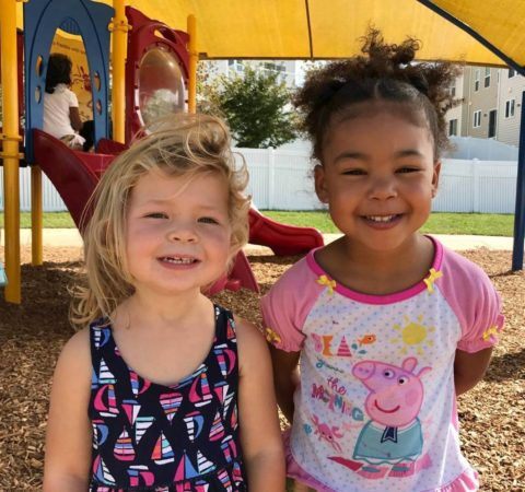 preschool_girls_on_playground_winwood_childrens_center_brambleton_ii_va-480x450