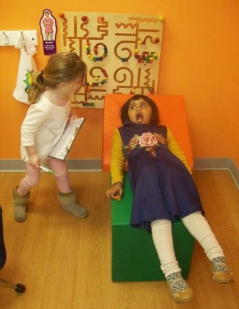 preschool_girls_playing_doctor_at_next_generation_childrens_centers_marlborough_ma-348x450