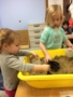preschool_girls_playing_with_sand_at_next_generation_childrens_centers_marlborough_ma-338x450